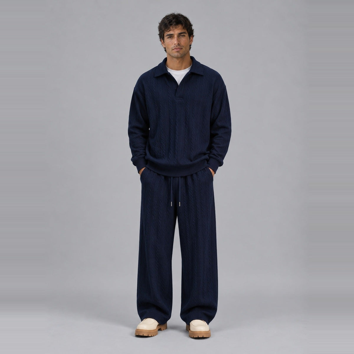 Man wearing navy textured collared sweatshirt and matching wide-leg trousers, full outfit | Chaps London