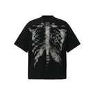 Black oversized t-shirt with ghostly rib cage graphic print, shown flat | Chaps London