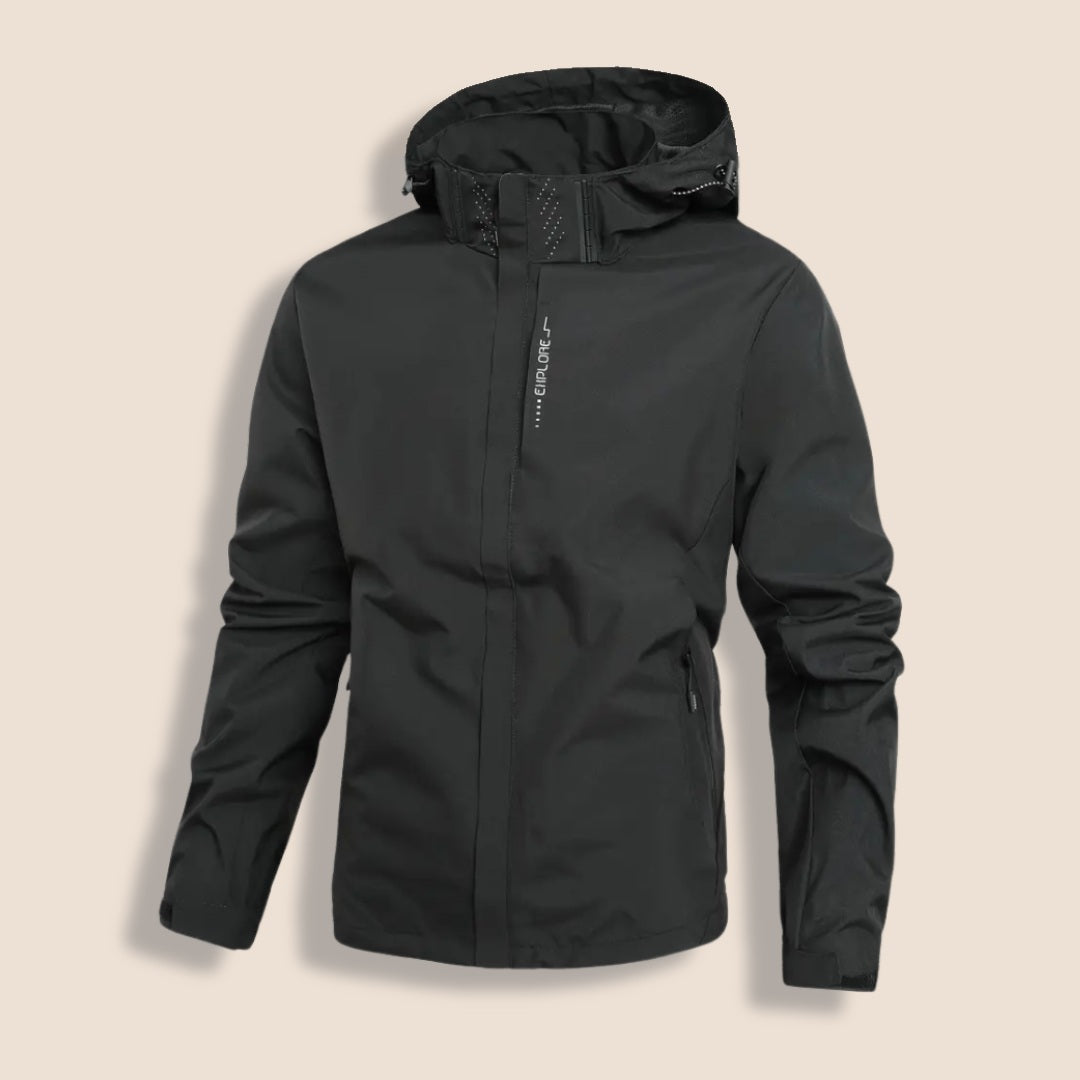 Black hooded rain jacket with zippered pockets, shown flat against beige background | Chaps London