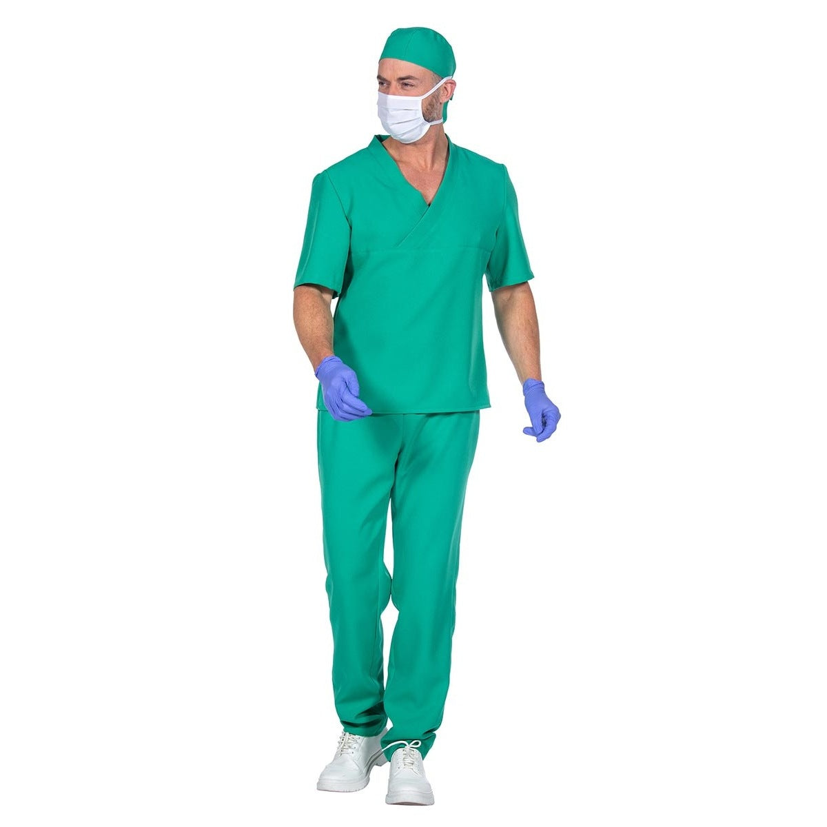 Man wearing green surgeon scrubs, cap, mask, and blue gloves, walking | Chaps London