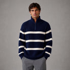 Man wearing navy striped half-zip ribbed knit jumper with grey trousers | Chaps London