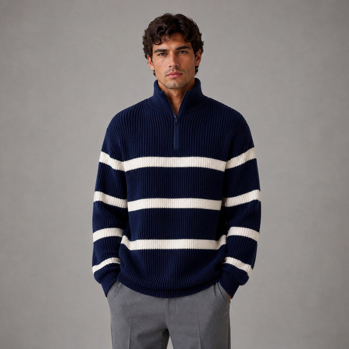 Man wearing navy striped half-zip ribbed knit jumper with grey trousers | Chaps London
