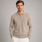Man wearing beige quarter zip polo jumper, fine knit, with white trousers | Chaps London