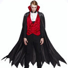 Man wearing black vampire cape with red velvet waistcoat and bow tie | Chaps London