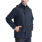 Man wearing navy hooded waterproof rain jacket with front pockets, zipped closed | Chaps London