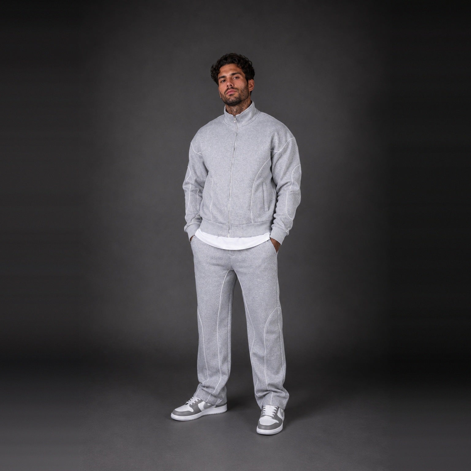 Man wearing light grey zip jacket and matching tracksuit pants | Chaps London