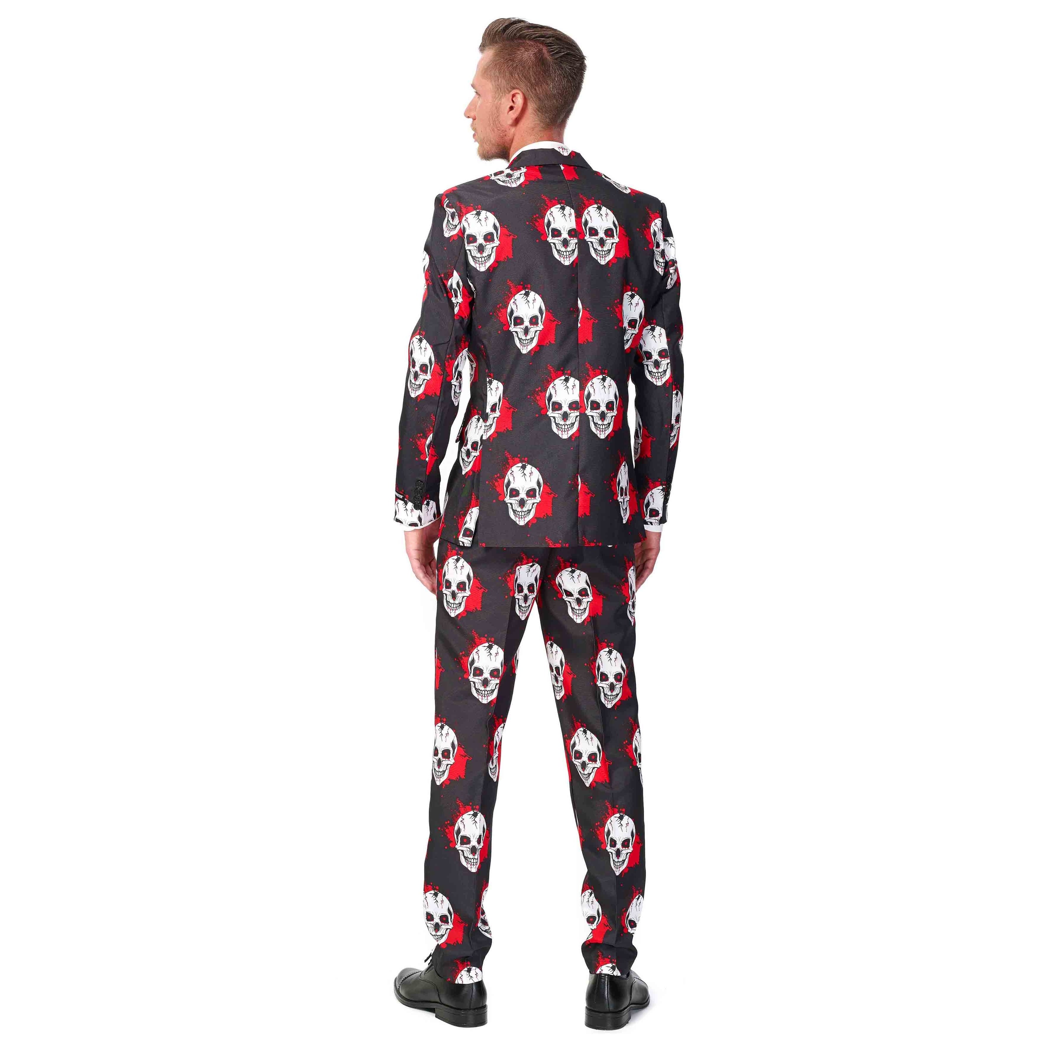 Man wearing black skull print suit jacket and trousers, back view | Chaps London