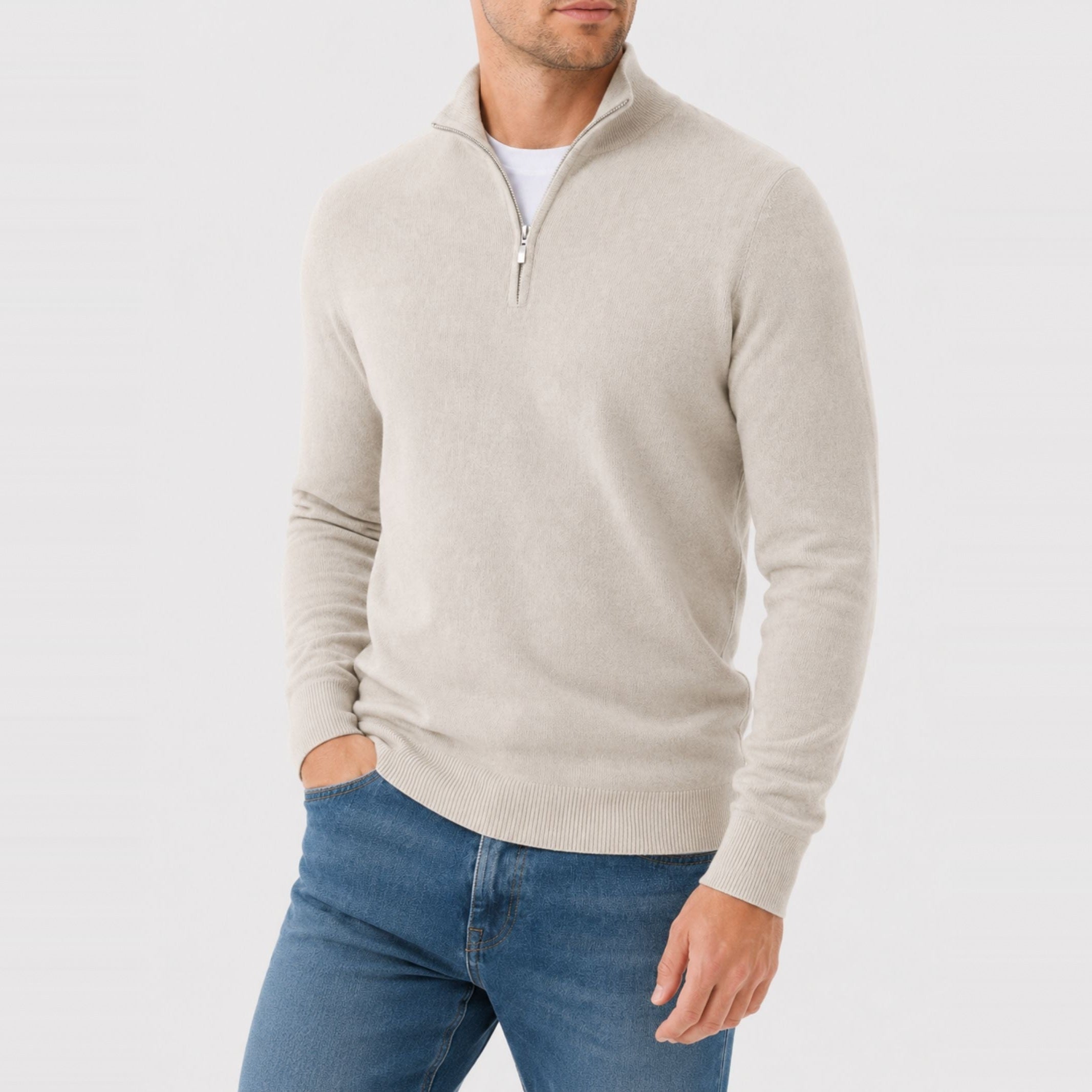 Man wearing beige quarter zip sweater with stand collar, jeans | Chaps London
