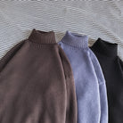 Three roll neck jumpers in brown, blue, and black knit fabric | Chaps London