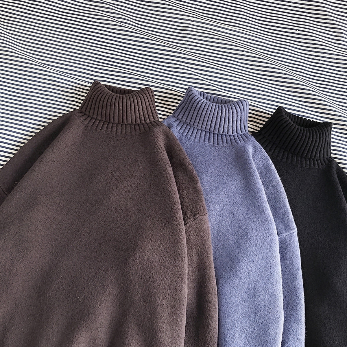 Three roll neck jumpers in brown, blue, and black knit fabric | Chaps London