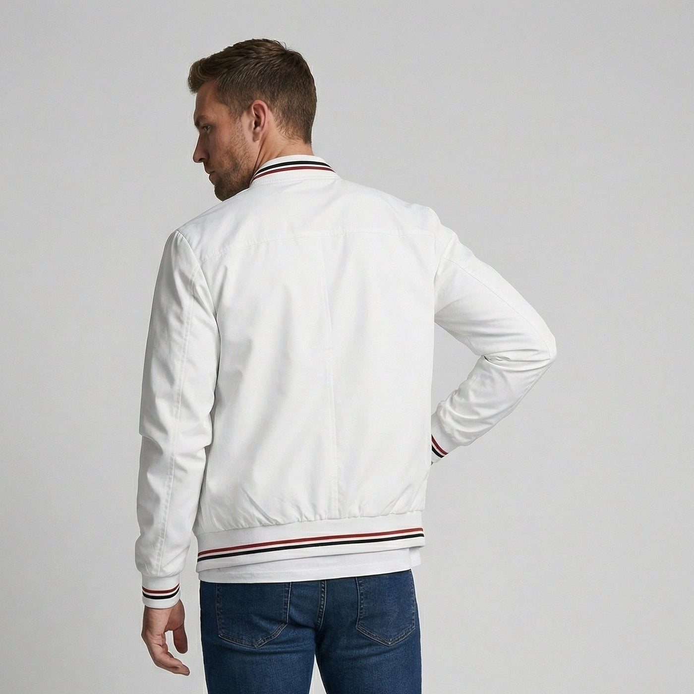 White bomber jacket with striped rib trim, worn by man from behind | Chaps London