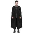 Man wearing black hooded cloak with buckle strap, full length photo | Chaps London