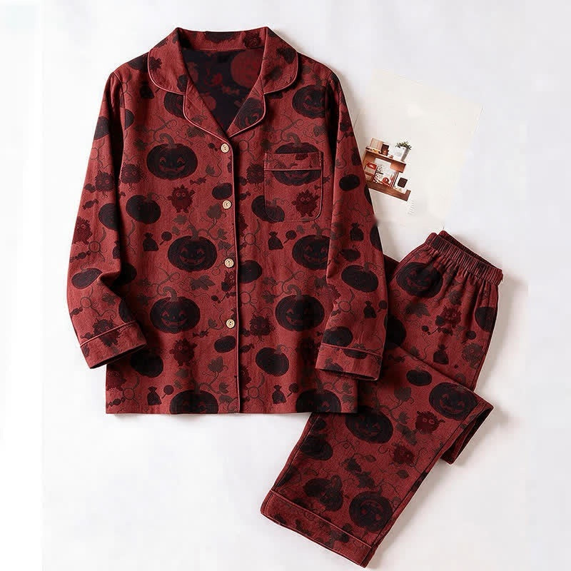 Red pyjama set with black pumpkin print, flat lay display | Chaps London