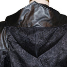 Black gothic hooded coat with jacquard panel on mannequin, close-up | Chaps London