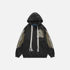Black oversized hoodie with contrast patchwork panels and embroidered bone design, flat lay | Chaps London