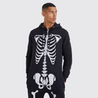Man wearing black hooded onesie with white skeleton bone print design | Chaps London