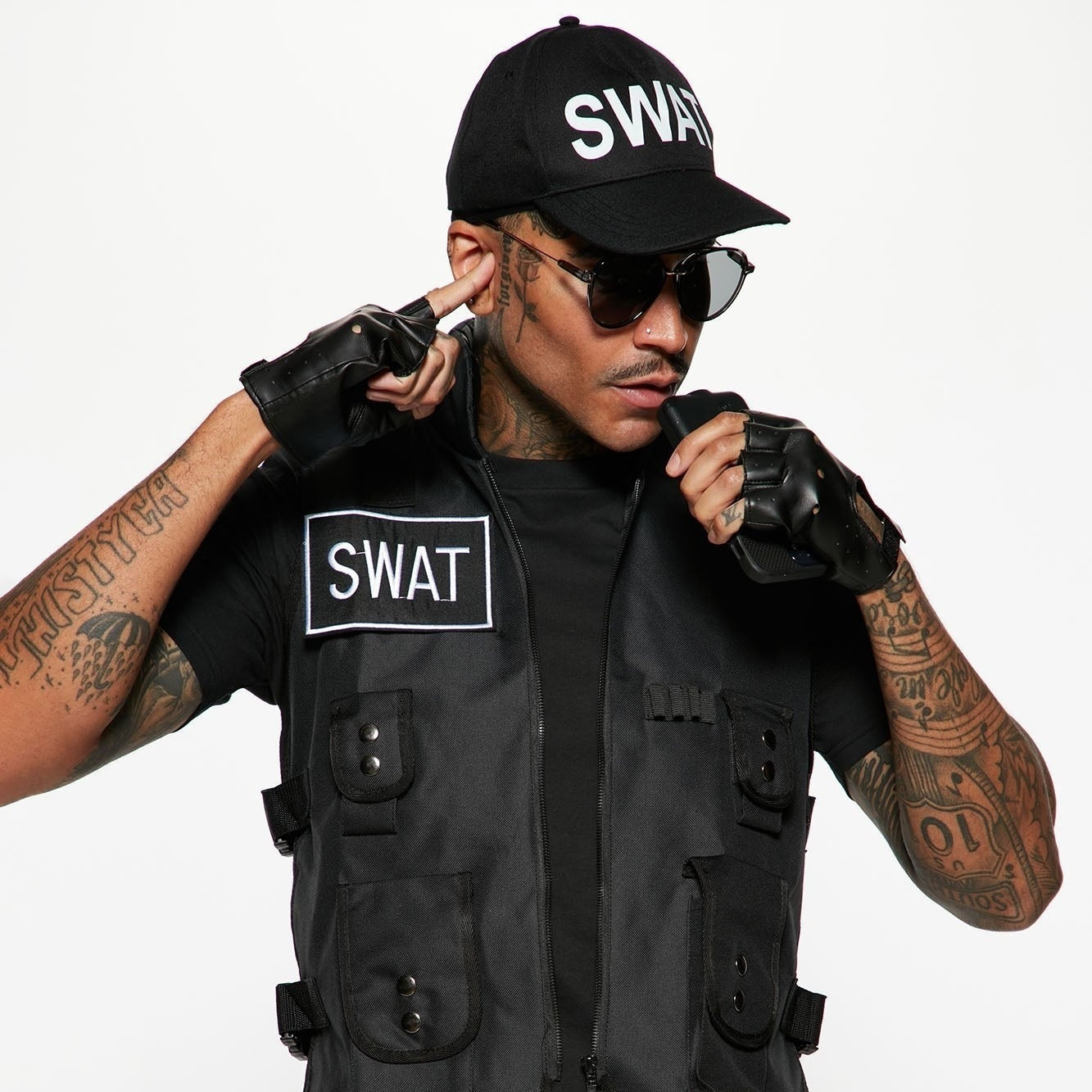 Man wearing black SWAT costume vest, cap, and fingerless gloves | Chaps London