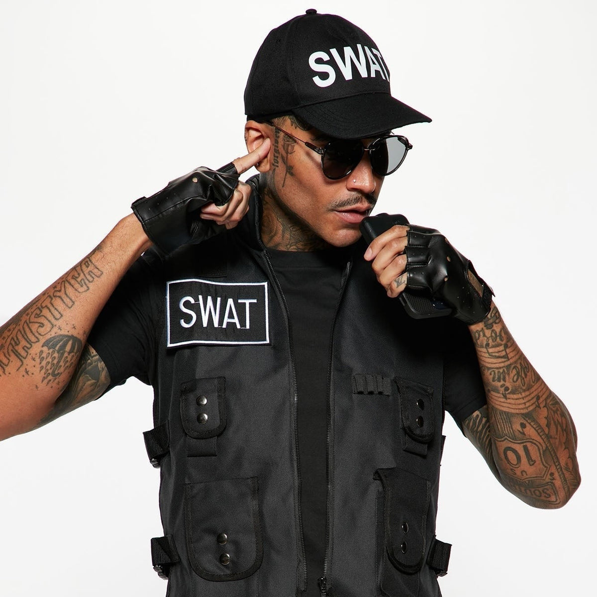 Man wearing black SWAT costume vest, cap, and fingerless gloves | Chaps London