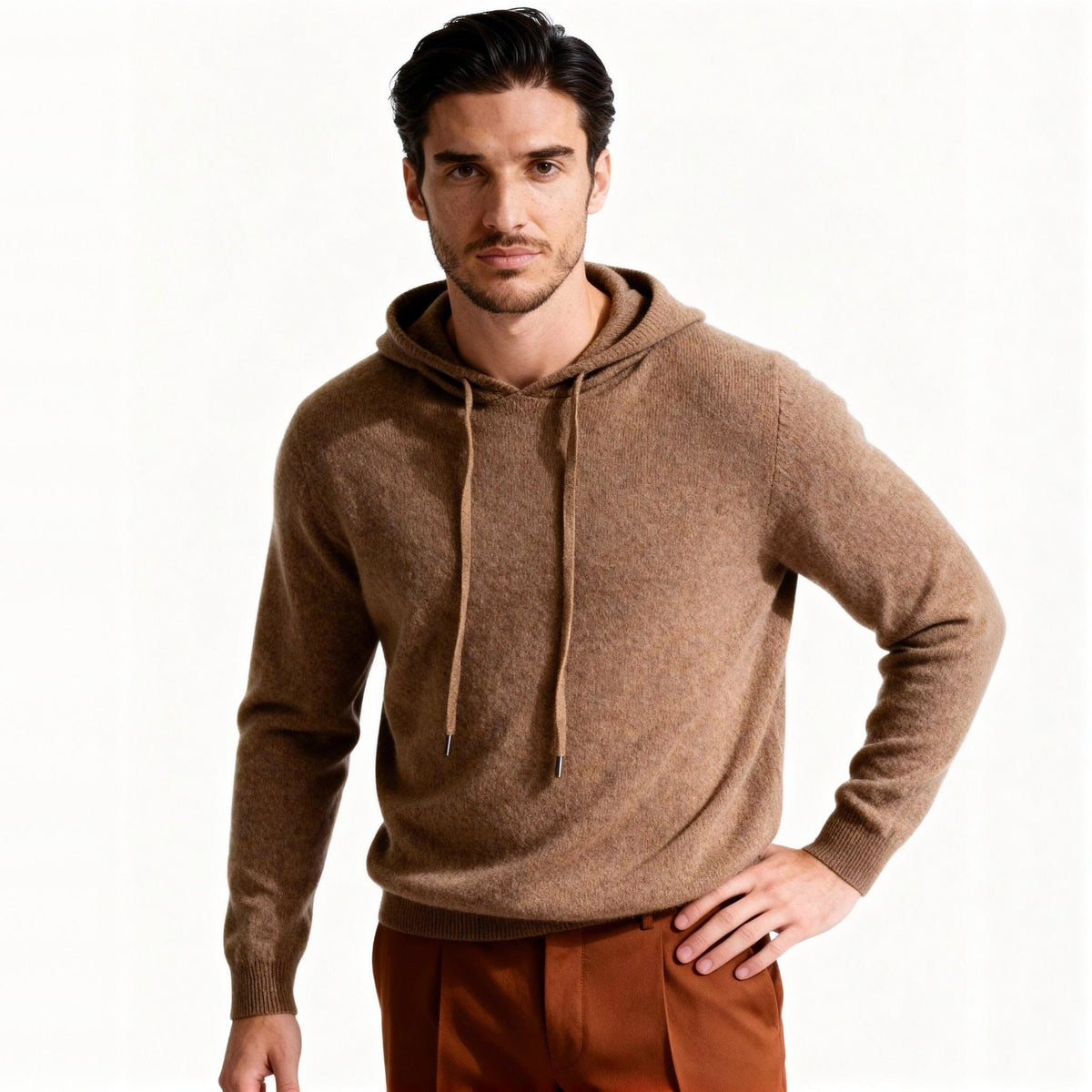 Man wearing camel knit hoodie with drawstring, paired with rust trousers | Chaps London