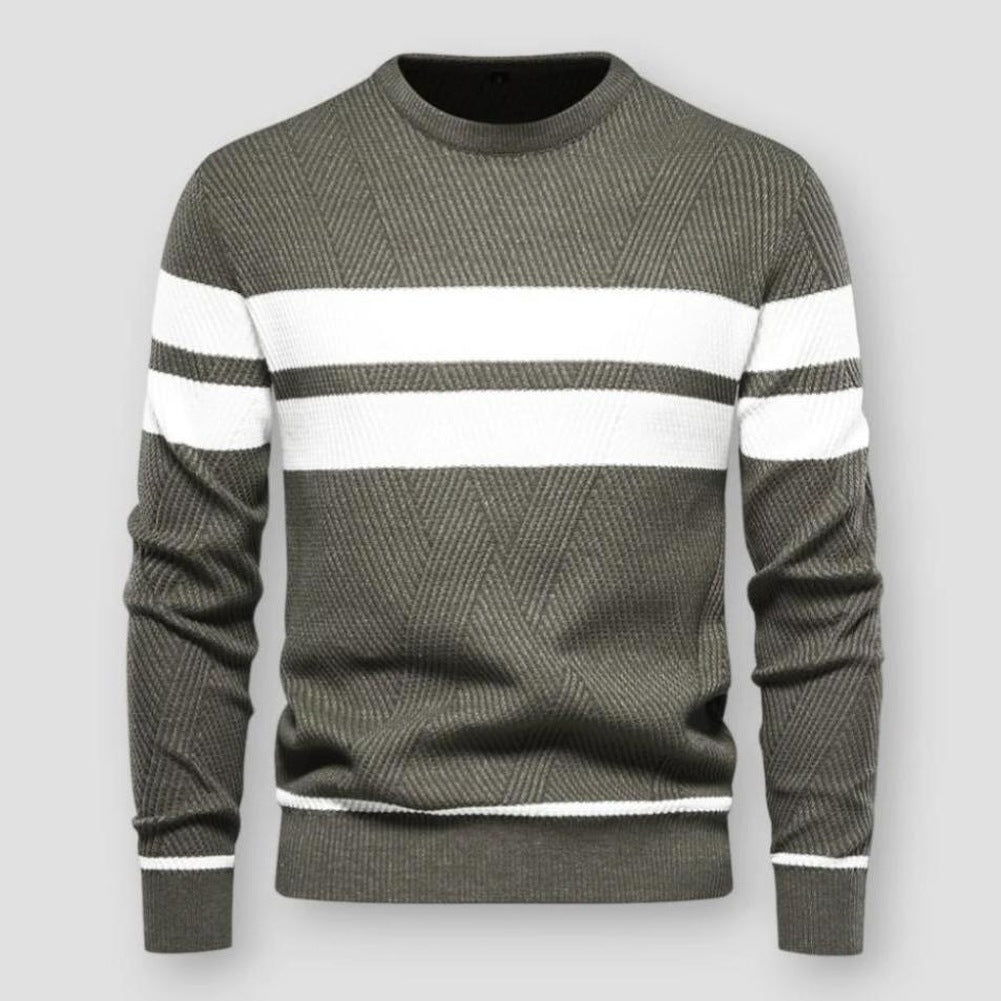 Olive green knit sweater with white chest stripes, worn by a person | Chaps London