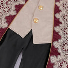Burgundy jacquard coat detail with lace trim, gold buttons, worn by person | Chaps London