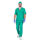 Man wearing green surgeon scrubs, cap, and face mask, walking | Chaps London