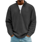 Man wearing dark grey ribbed knit half zip jumper, hands in pockets | Chaps London