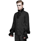 Black gothic shirt with embroidered detail and lace cravat, worn by man | Chaps London