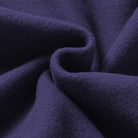 Close-up swirled navy blue fabric texture with soft folds and draping | Chaps London