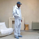 Man wearing light blue oversized zip hoodie and matching jogger sweatpants | Chaps London