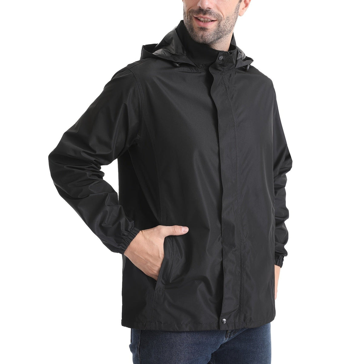 Man wearing black hooded rain jacket with zipper, hands in pockets | Chaps London