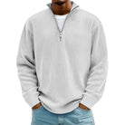 Man wearing light grey ribbed knit half-zip jumper over white shirt | Chaps London
