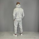 Man wearing grey hoodie and jogger tracksuit, rear view | Chaps London