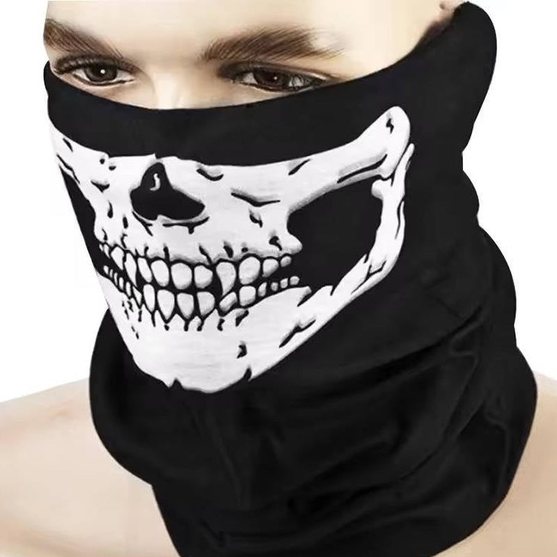 Black skull face mask with white skeleton print worn by person | Chaps London