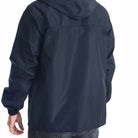 Man wearing navy blue hooded rain jacket, back view, worn outdoors | Chaps London