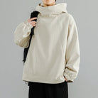 Beige waffle-texture oversized hoodie with funnel neck, worn by man with backpack | Chaps London