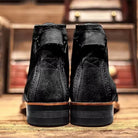 Black ankle boots rear view, stacked heel, displayed on wooden surface | Chaps London