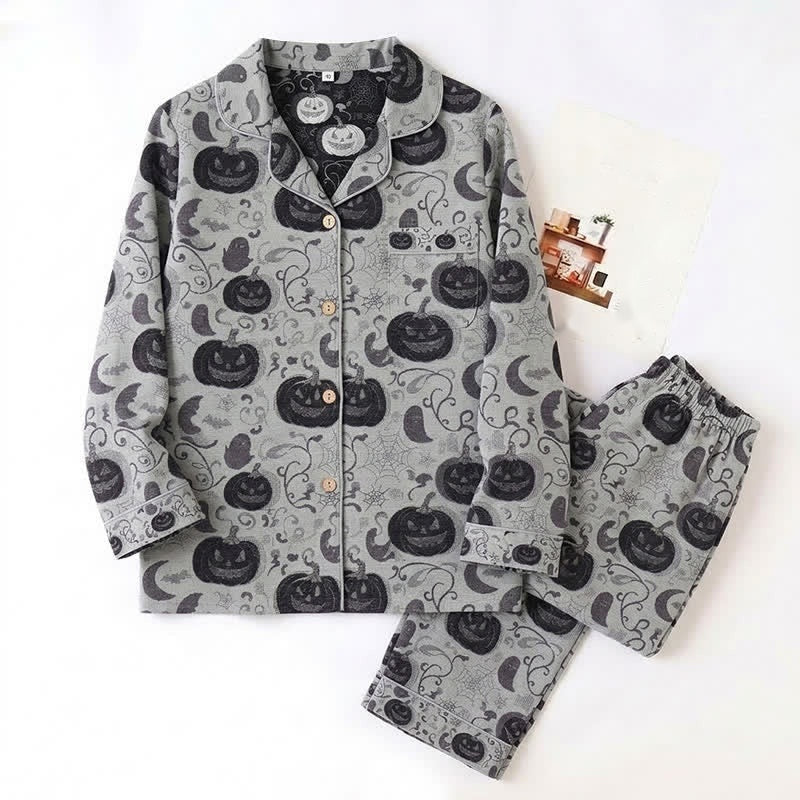 Grey pyjama set with pumpkin and moon print, laid flat | Chaps London
