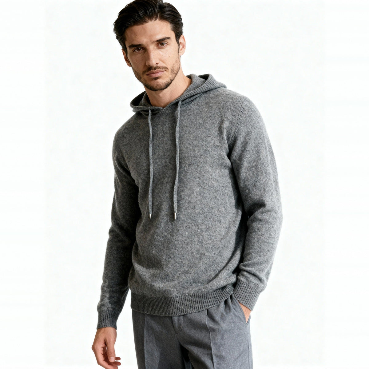 Man wearing gray knit hooded sweater with drawstring, paired with trousers | Chaps London