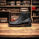 Black lace-up ankle boot with stacked heel, shown standing alone sideways | Chaps London