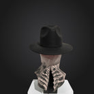 Black fedora hat on ribbed textured mannequin head with ruffled neck | Chaps London