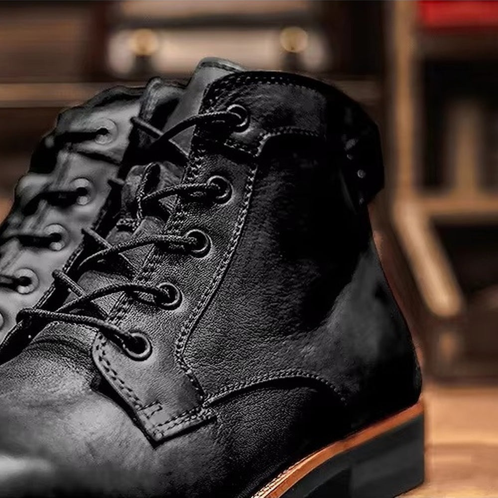 Black lace-up ankle boot with stacked heel, close-up studio shot | Chaps London