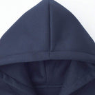 Close-up of navy hoodie, showing hood and drawstring details, unworn | Chaps London