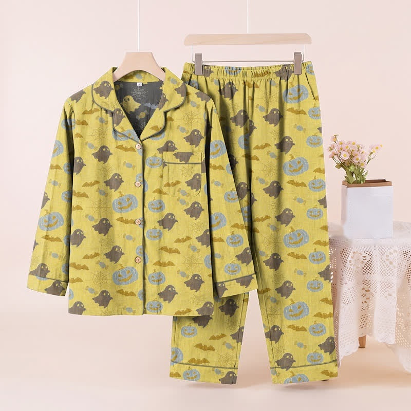 Yellow pyjama set with ghost and pumpkin print on hanger | Chaps London