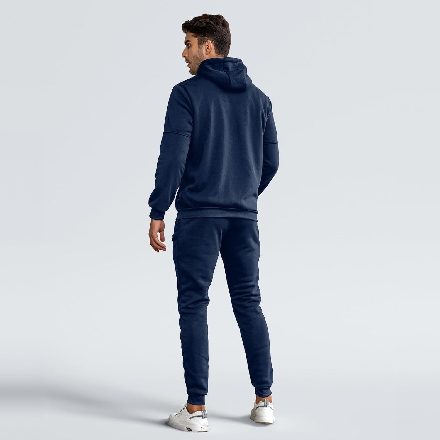 Man wearing navy zip hoodie and matching joggers, rear view, worn | Chaps London