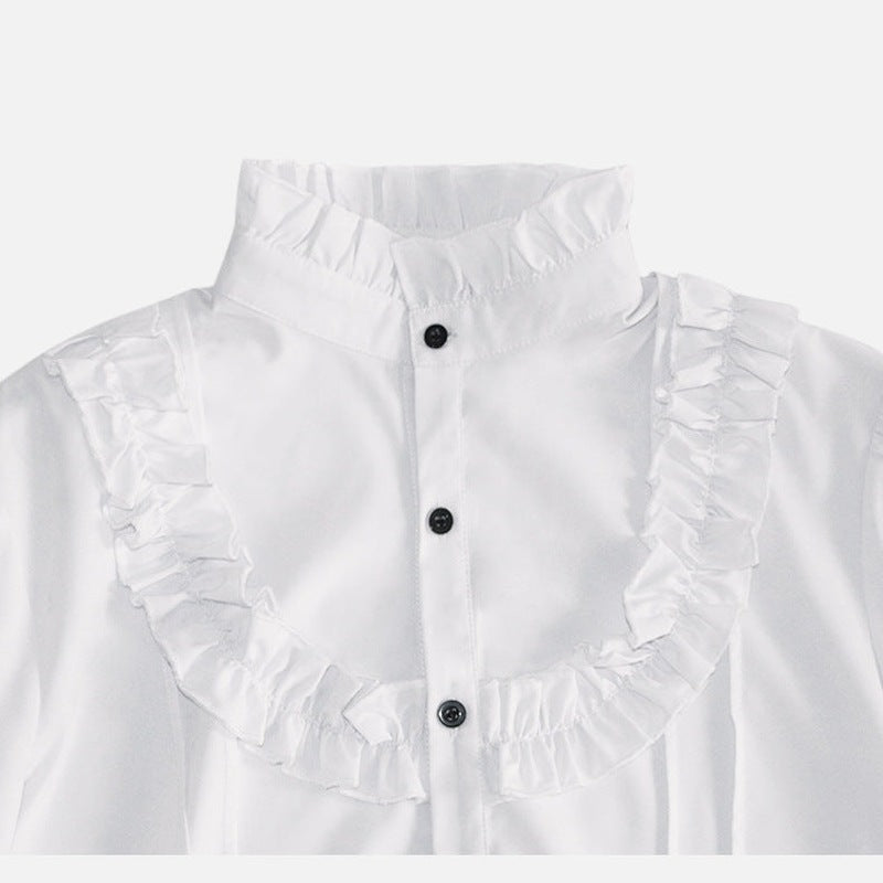 White ruffled shirt with stand collar, black buttons, worn by person | Chaps London