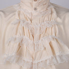 Cream ruffled jabot shirt with tiered lace detail, worn by person | Chaps London