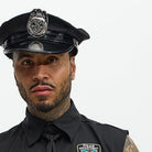 Man wearing black police costume with hat, badge, and tie | Chaps London
