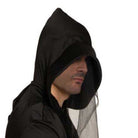 Man wearing black hooded robe with mesh face veil, side view | Chaps London