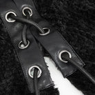 Black lace-up strap with grommets and cord, close-up detail shot | Chaps London